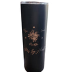 Black tumbler with floral and text design on a white background