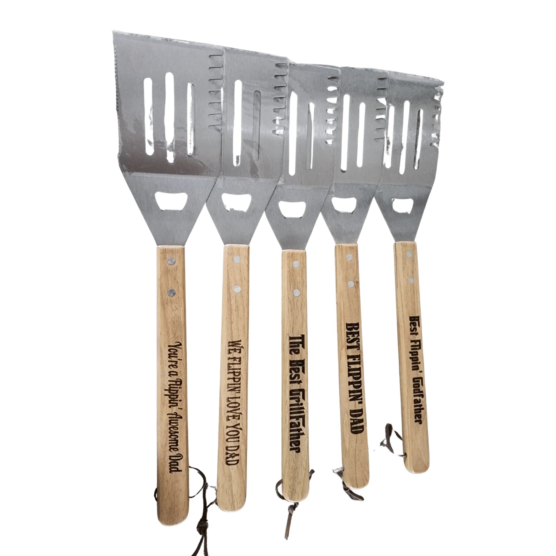 Set of four spatulas with wooden handles and engraved text on a white background