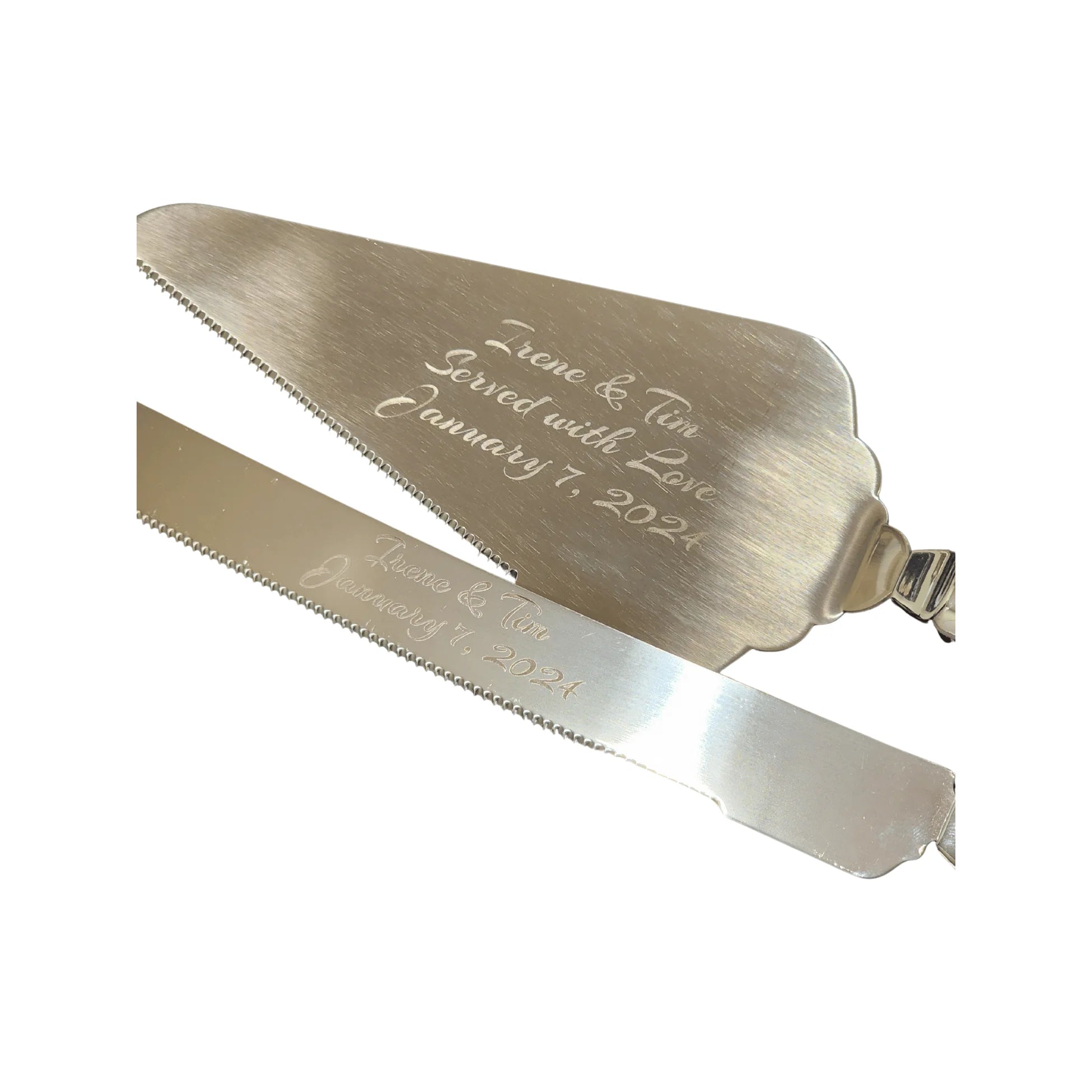 Silver cake server set with engraved text on a white background
