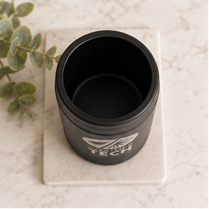 A 3x3 collage showing a matte black insulated tumbler from multiple angles, with a silver can sometimes beside it. The tumbler has a white printed logo and the words 'WELLNESS TECH.